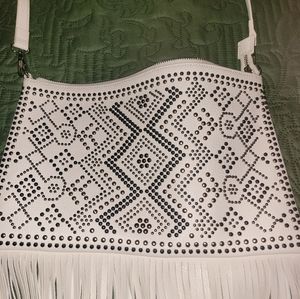 Charming Charlie studded fringe bag.